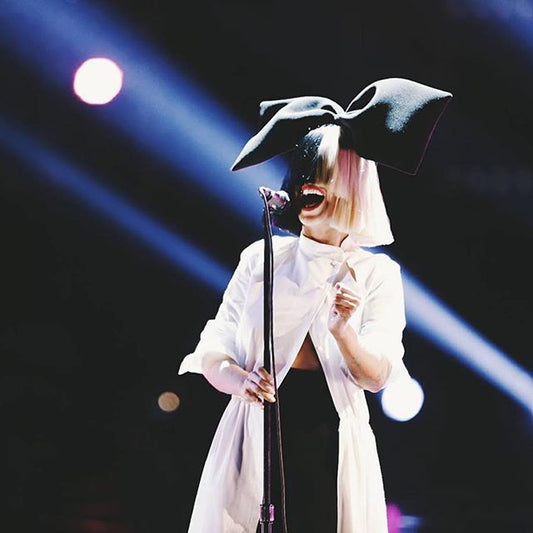 Famous topline vocalist and pop singer-songwriter, Sia. Performing live on stage.